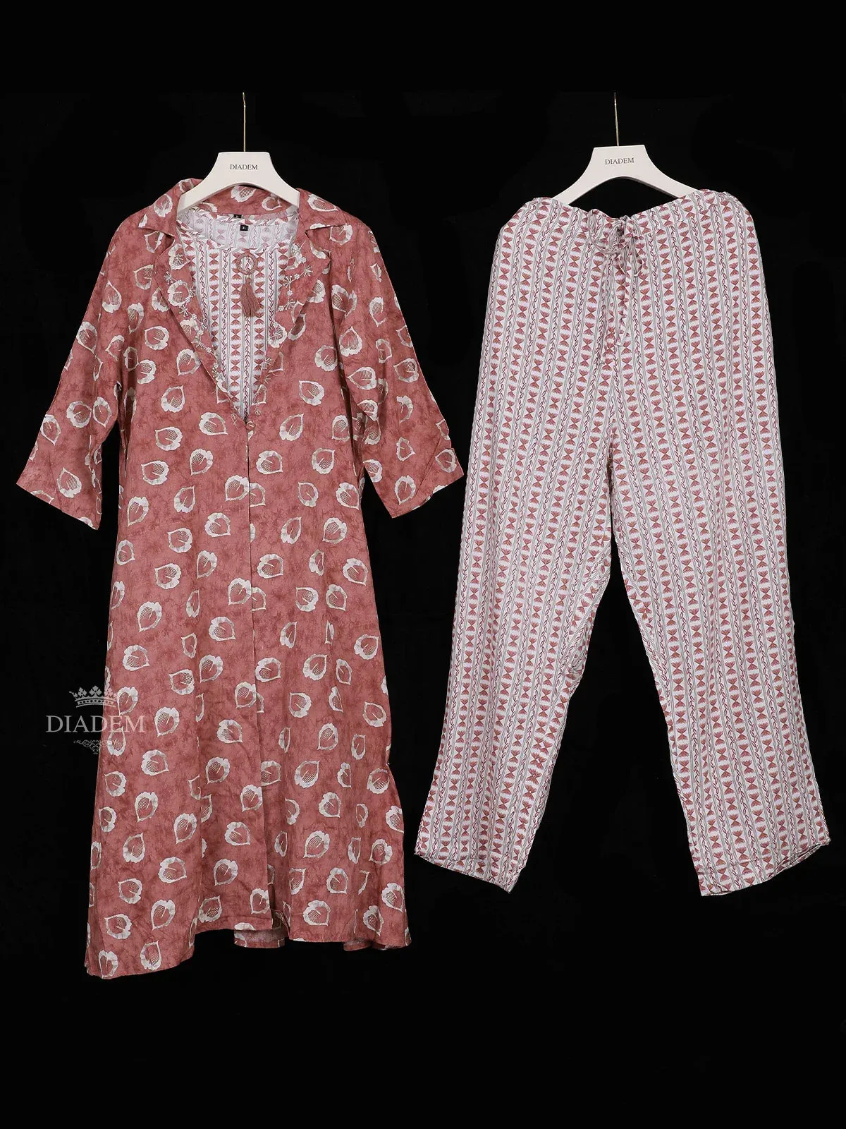 Dark Peach Crepe Straight Cut Suit Adorned with Floral Prints